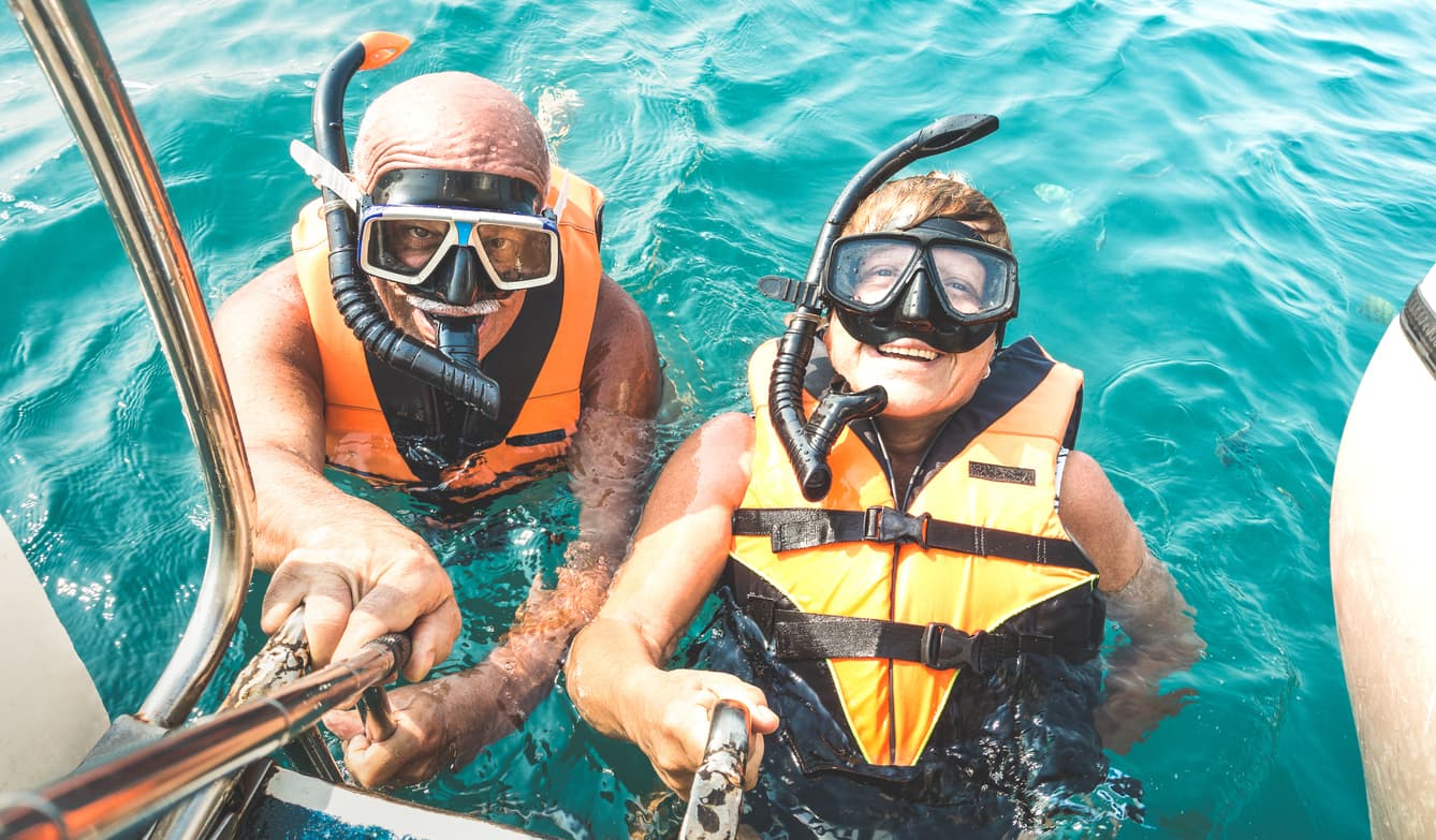 Best Snorkeling Sites in Red Sea couple taking selfie with life jackets, Best Snorkeling Sites in Red Sea